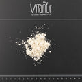 Bio Mandelprotein Pulver auf schwarzem Hintergrund mit Lineal, Vitanur Marke sichtbar